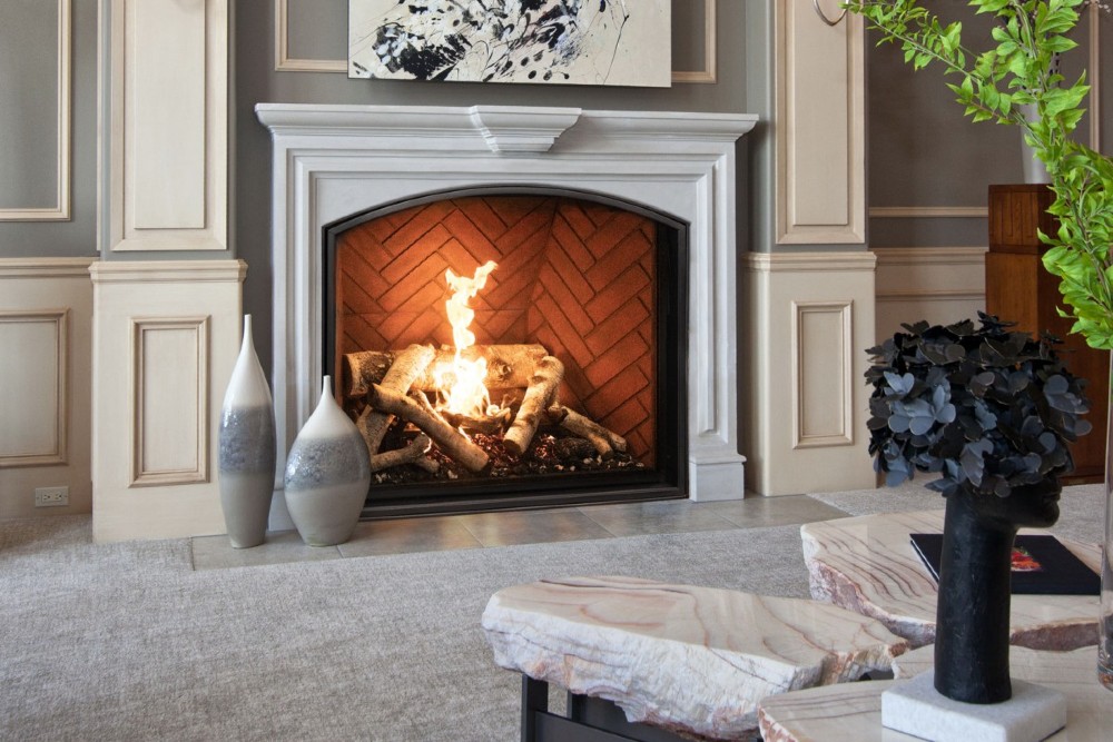 Traditional gas fireplace with realistic flames and elegant surround, available from Blue Oak Fireplaces in Leicester